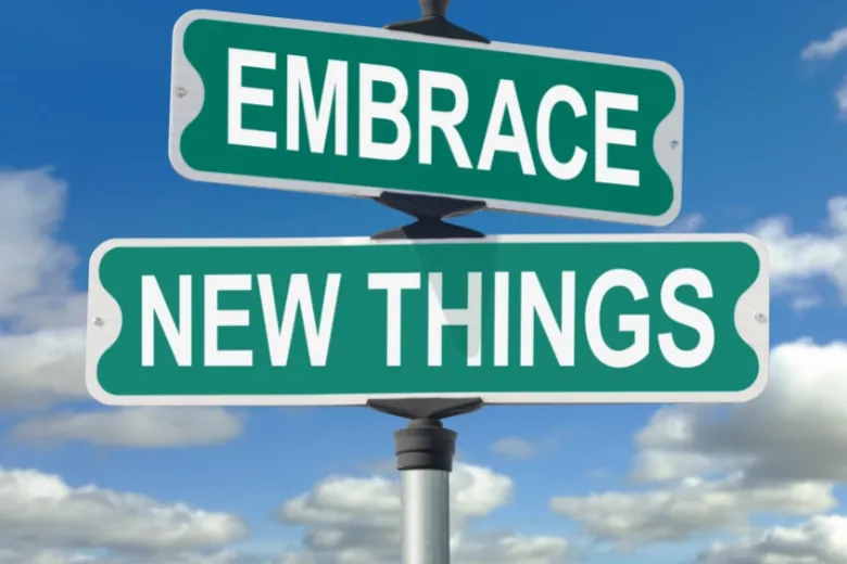 sign saying embrace new things